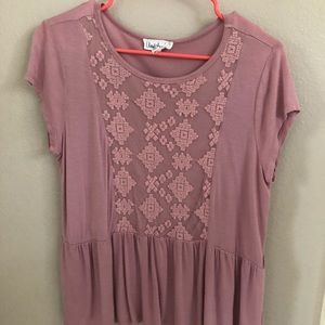 pink top with peplum bottom